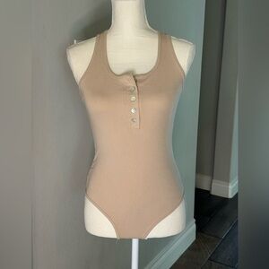 Cute nude bodysuit tank. Size medium.